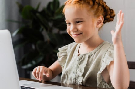 Girl waving at webcam Girl waving at webcam
