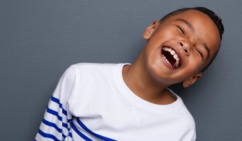 Young boy laughing